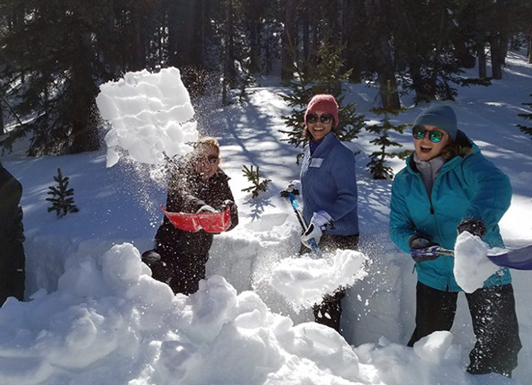 PROGRESS participants play in the snow.