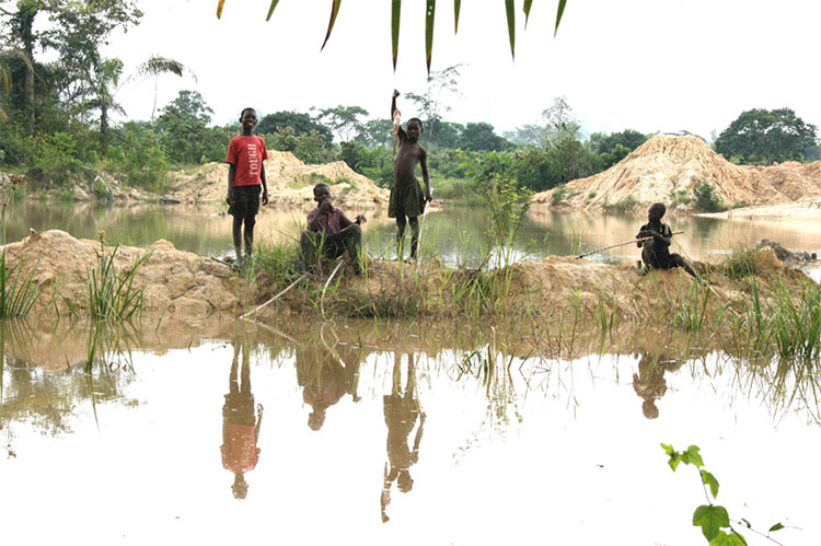 Boys fishing in Ghana