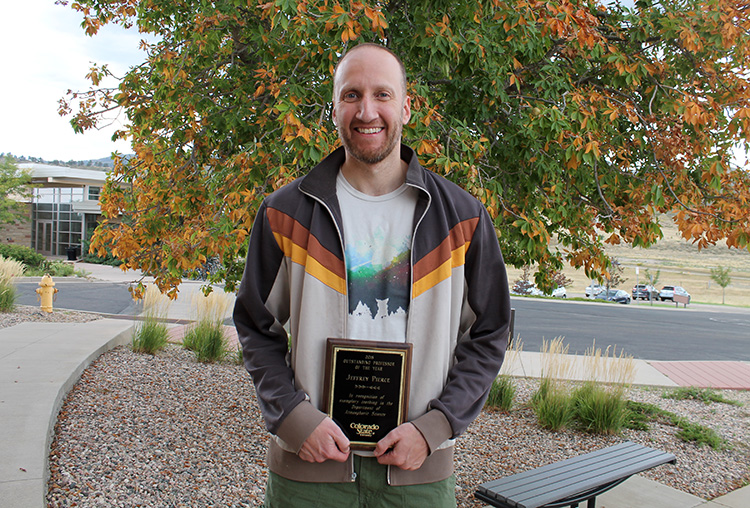 Jeff Pierce with his Outstanding Professor of the Year award