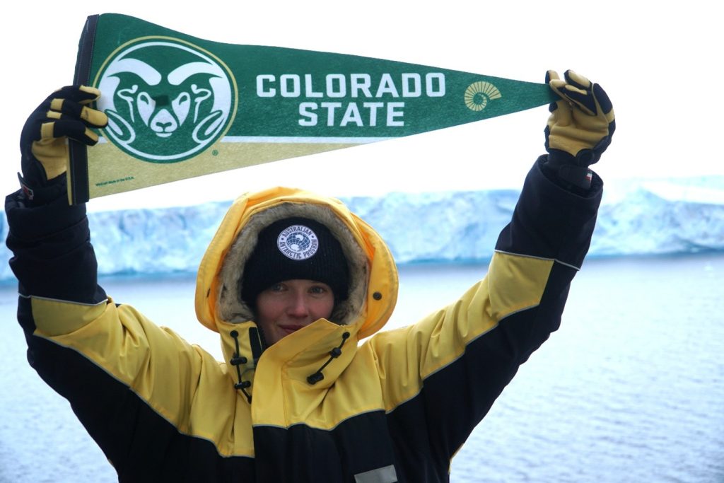 Chelsea holding up CSU flag